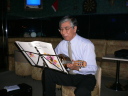 A man playing mandolin ̂P